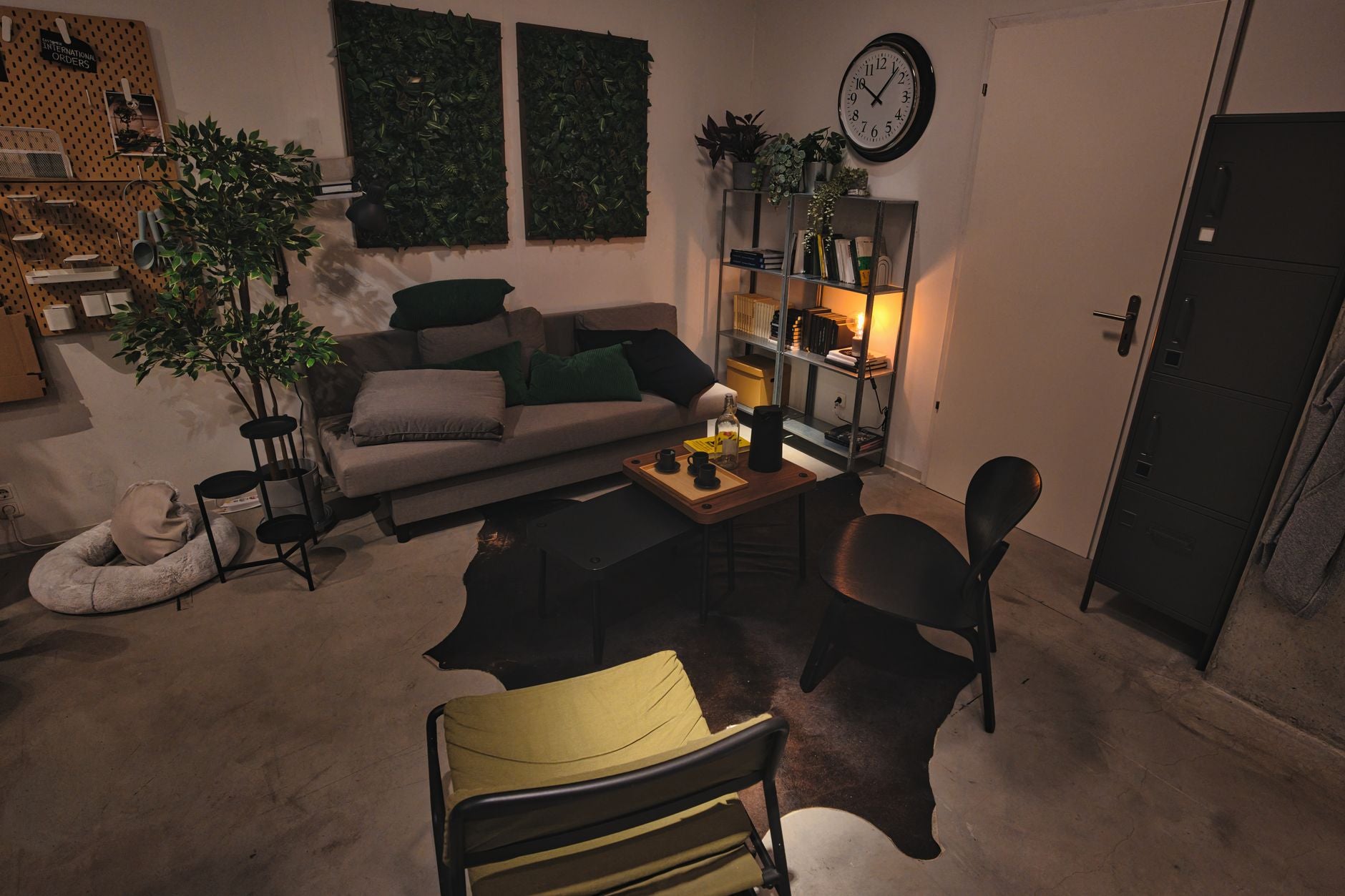 A stylish modern living room with cozy seating and ambient lighting for a relaxing atmosphere.