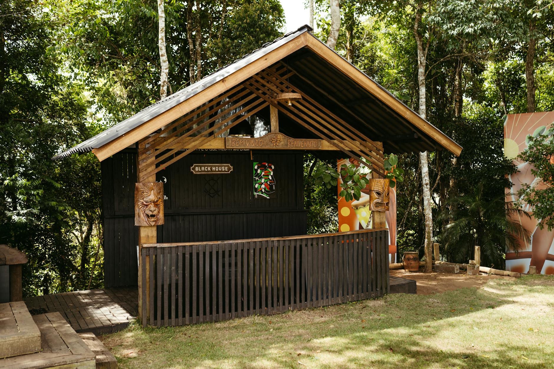 Explore the unique Black House nestled in the lush greenery of Santa Teresa, Brazil.