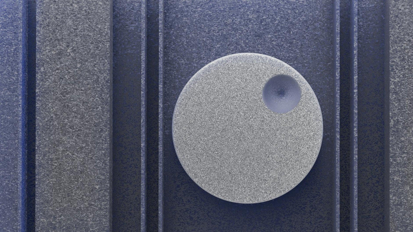 Abstract circular design with textured details in tones of blue and grey.